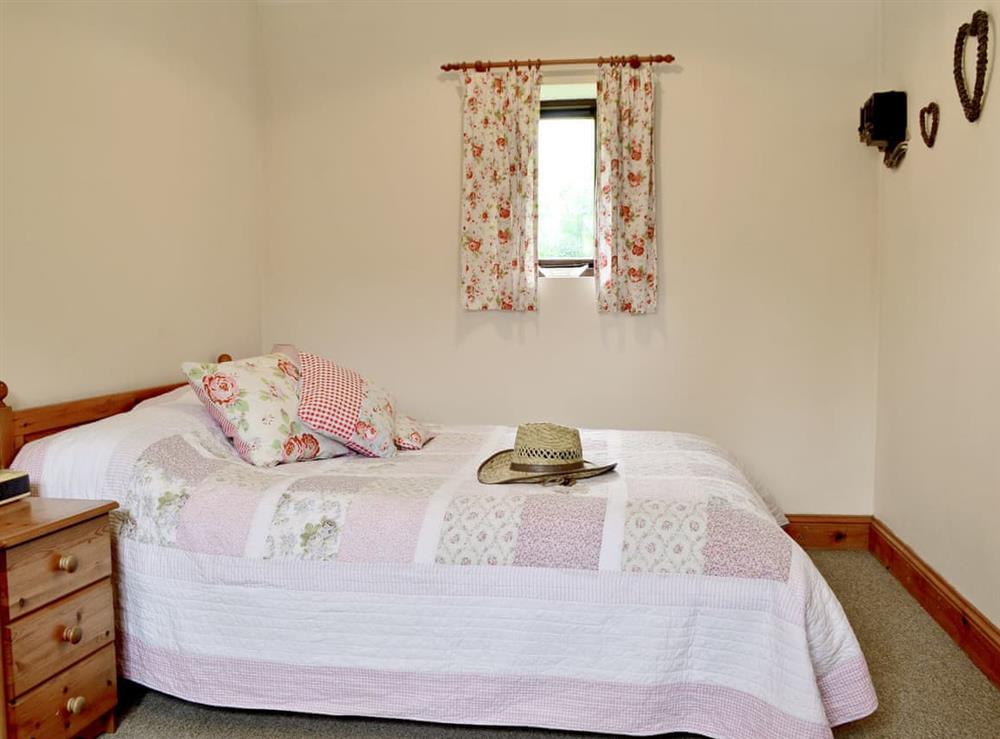 Comfortable double bedroom at The Carthouse in Malmesbury, Wiltshire