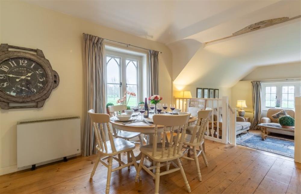 Dining space with steps down to living area at The Cartlodge, Higham