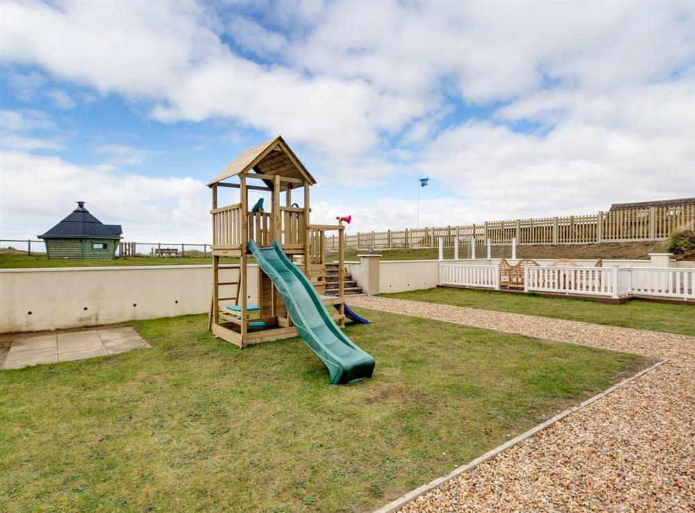 Spacious garden with children’s play area at The Castle in Brean, Somerset