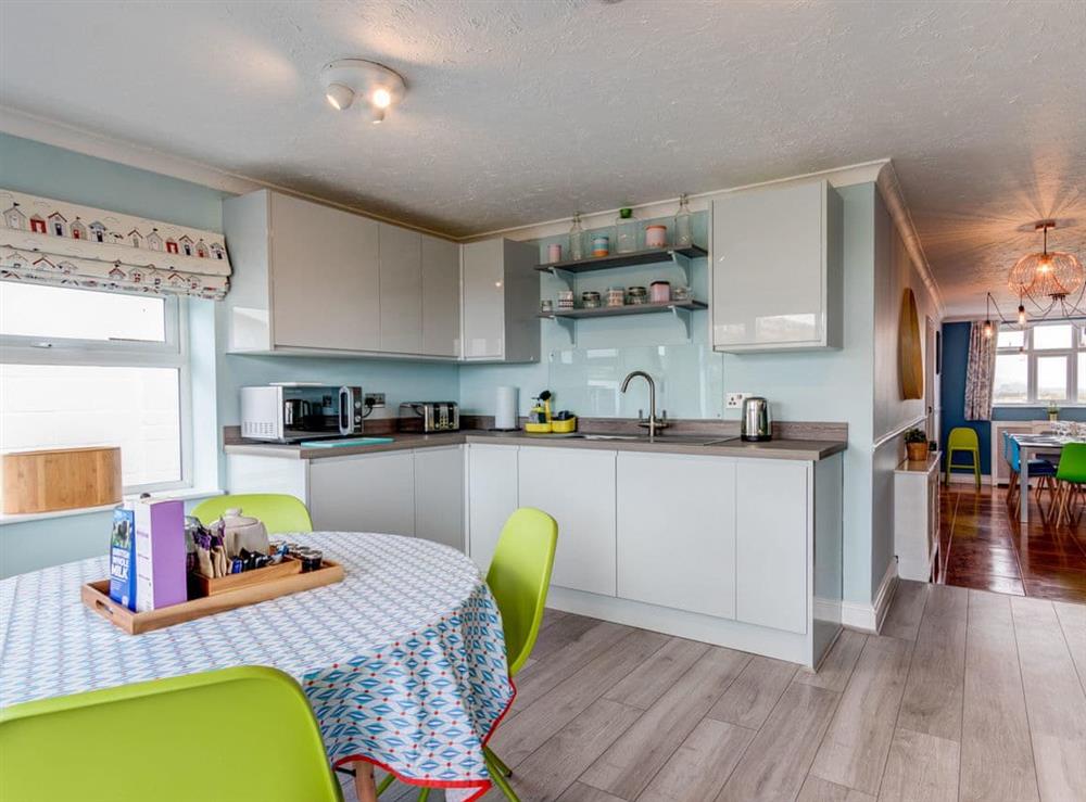 Spacious kitchen with dining area at The Castle in Brean, Somerset