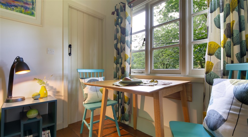 The sitting and dining room (photo 3) at The Chalet At Tan Yr Ogof in Beddgelert, Gwynedd