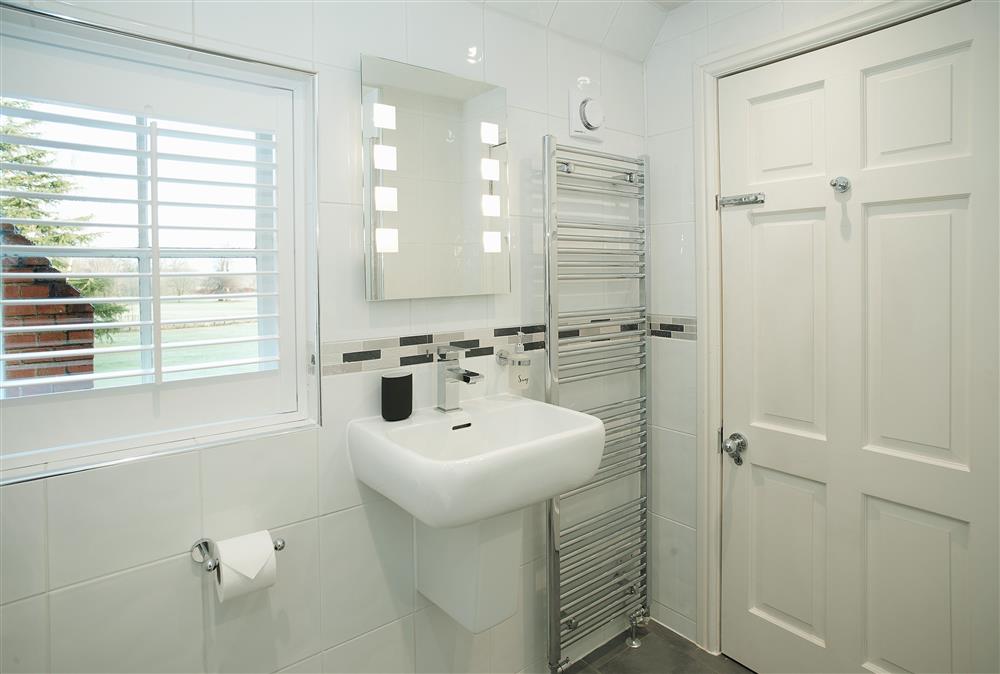 Family shower room with walk in rainfall shower at The Chapel House, Arley