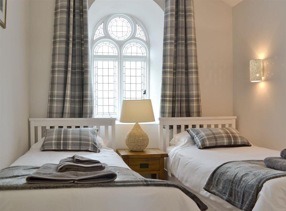 Relaxing twin bedroom with feature window at The Chapel in near Whitland, Dyfed
