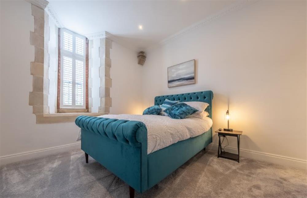 Ground floor: Bedroom five with king-size bed at The Chapel, North Elmham near Dereham