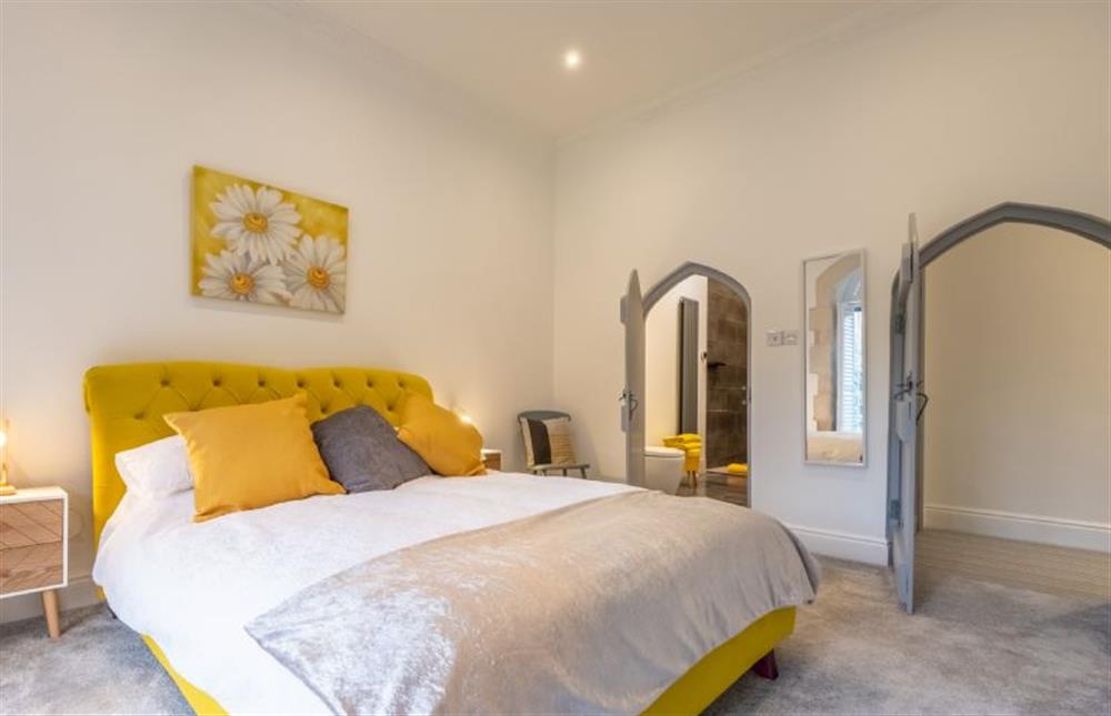 Ground floor: Bedroom three with king-size bed at The Chapel, North Elmham near Dereham