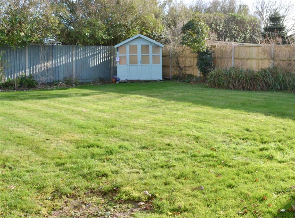 Large enclosed garden to rear of property at The Chase in Walcott, near North Walsham, Norfolk