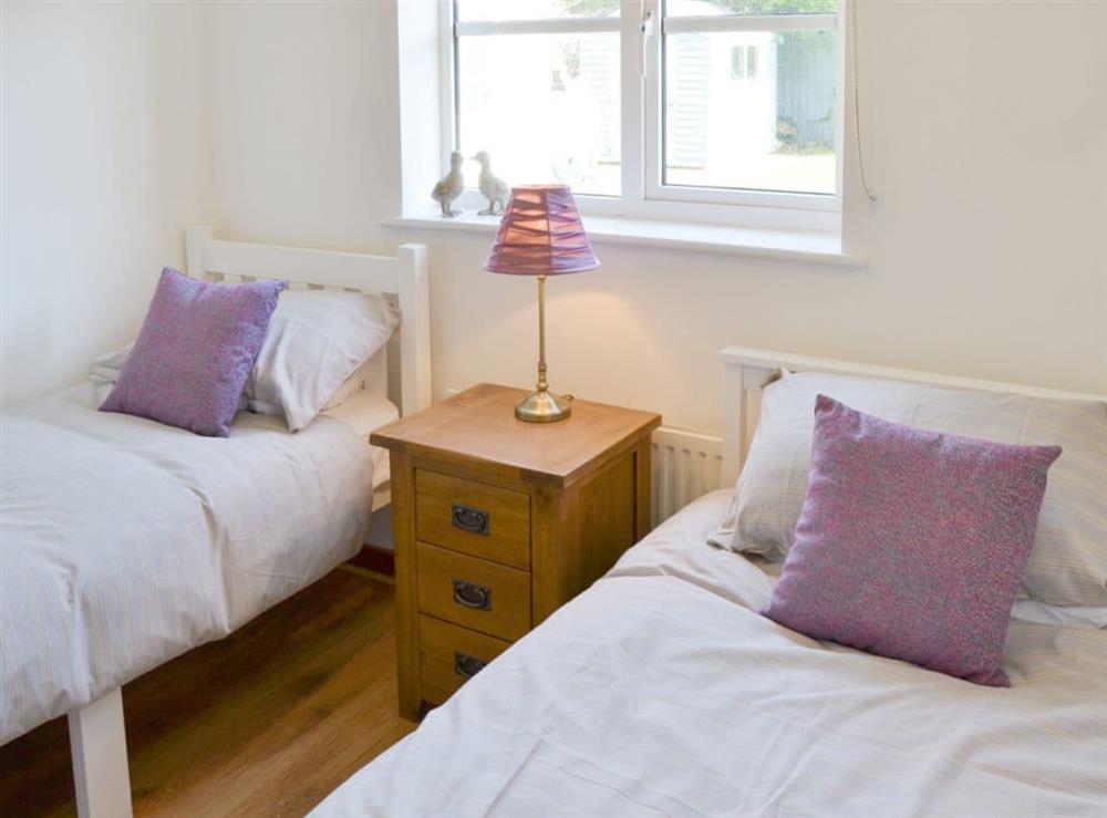 Light and airy twin bedroom at The Chase in Walcott, near North Walsham, Norfolk