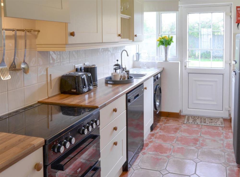 Well-equipped fitted kitchen at The Chase in Walcott, near North Walsham, Norfolk