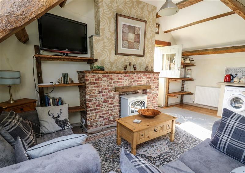 Relax in the living area at The Cheese Loft, White Mill near Carmarthen