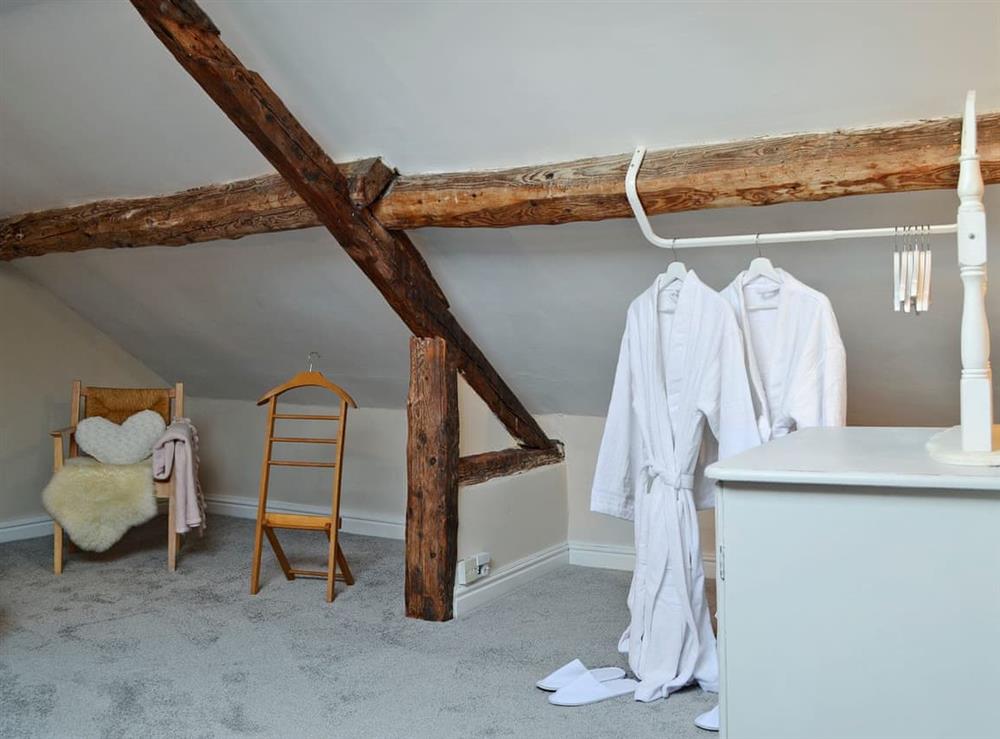 Luxurious double bedroom with dressing gowns at The Cider Barn in Combe, near Presteigne, Herefordshire