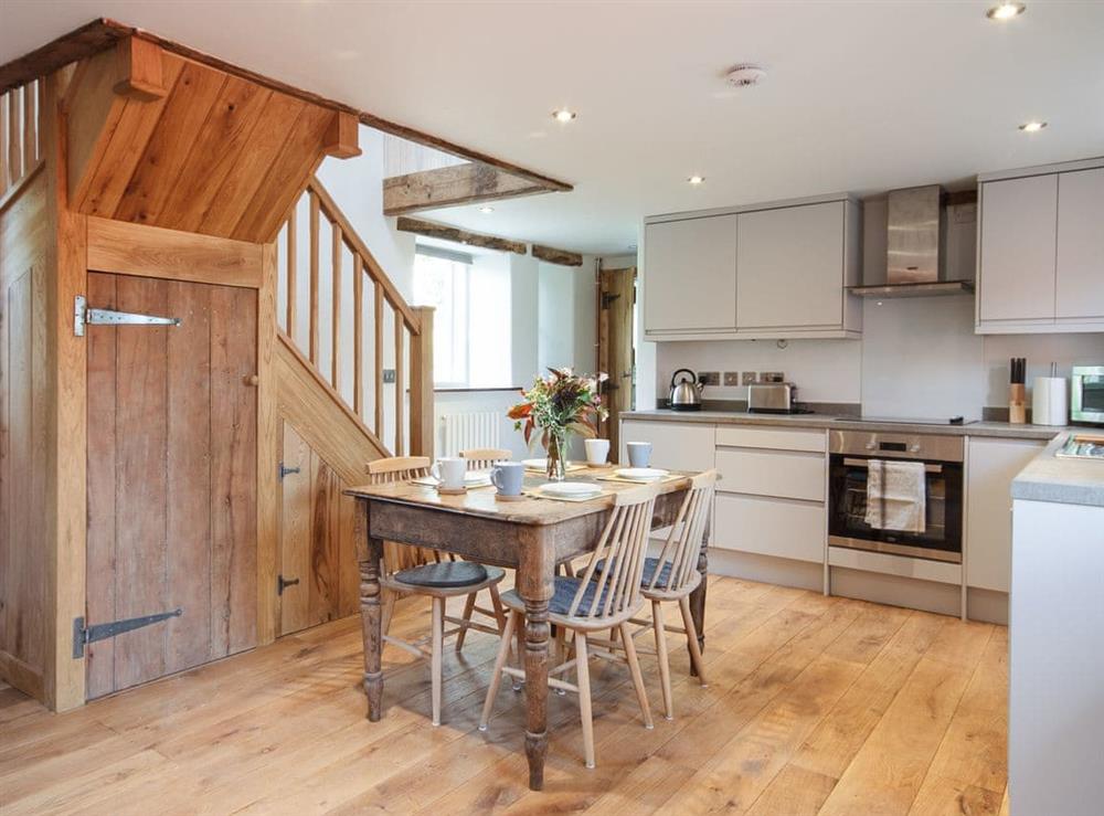Kitchen with dining area at The Cider Barn in Little Dean, near Cinderford, Gloucestershire