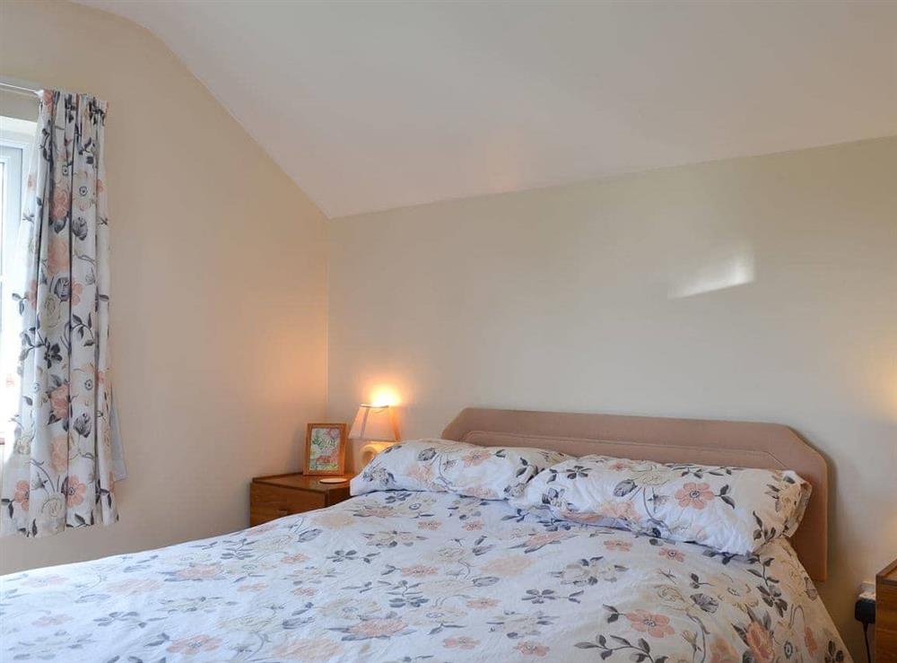 Warm and welcoming double bedroom at The Cider Mill Cottage in Orleton, near Ludlow, Shropshire