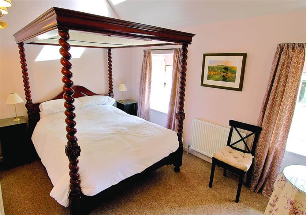 The Clock House four poster bed at The Clock House in Gordon, Berwickshire