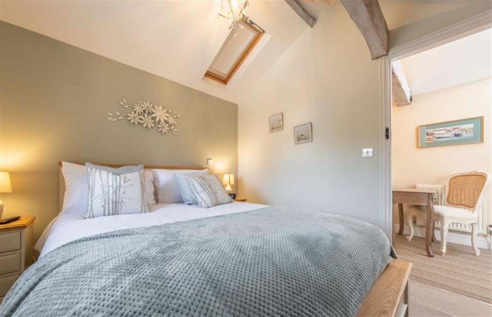 The bedroom offers a tranquil space to relax  at The Clockhouse, North Lopham