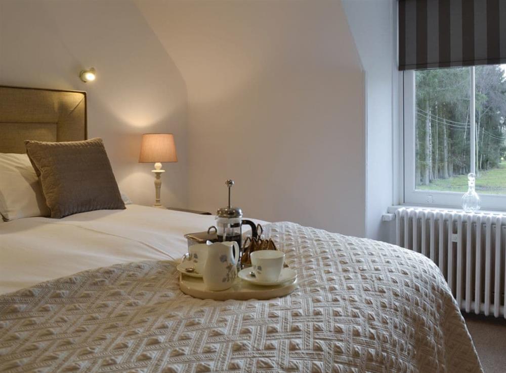 Enjoy breakfast in bed in the sumptuous double bedroom at The Coach House in Alford, Aberdeenshire