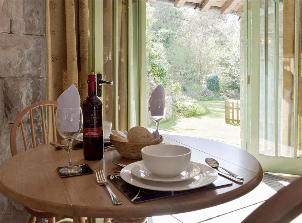 Convenient dining area at The Coach House at Stable Cottage in Derwydd, near Llandeilo, Carmarthenshire, Dyfed