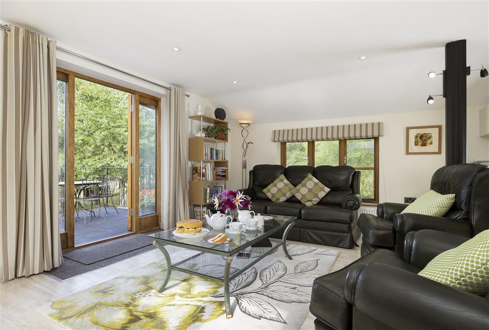 Open-plan living area with comfortable seating at The Coach House at The Old Rectory, Leominster