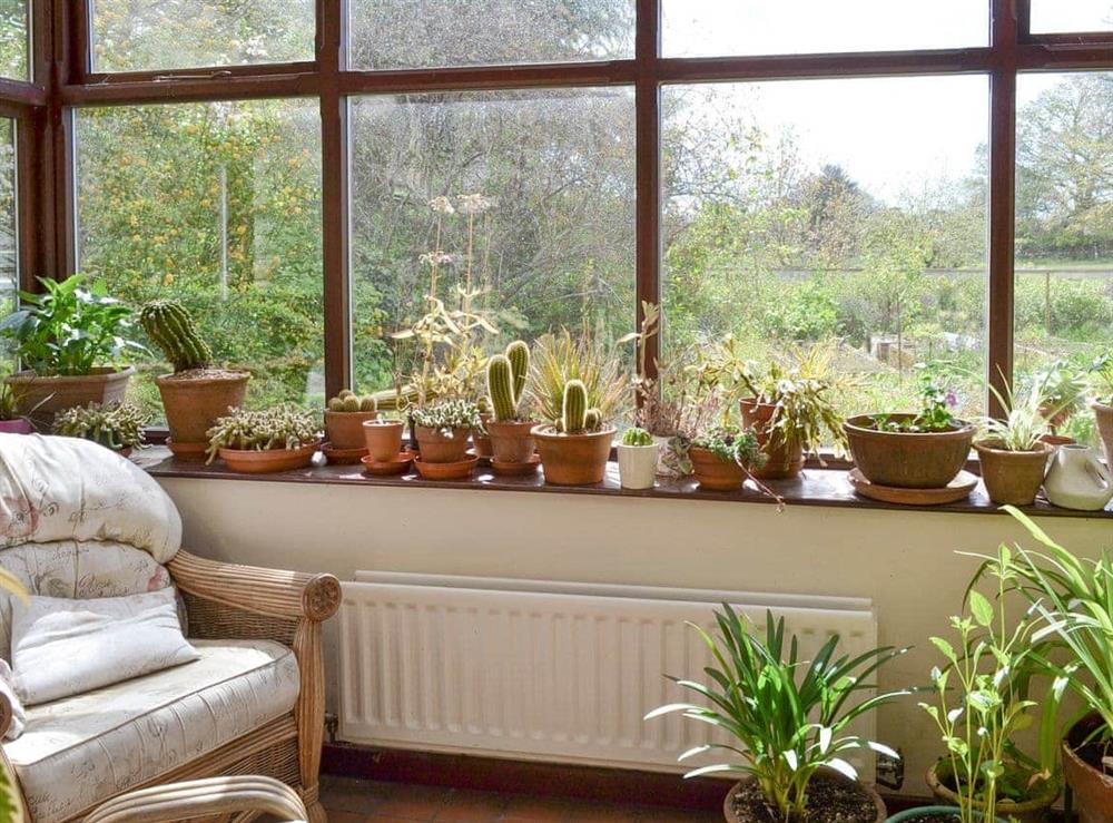 Conservatory with garden views at The Coach House in Bootle, near Millom, Cumbria