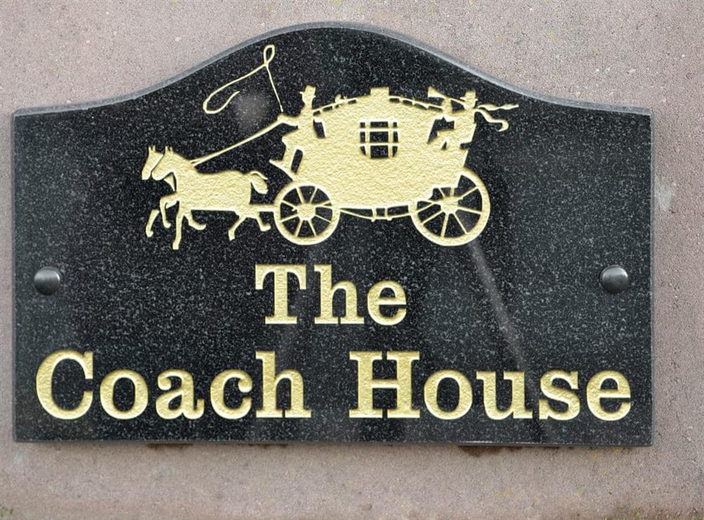Ornate welcoming name plaque at The Coach House in Brampton, Cumbria