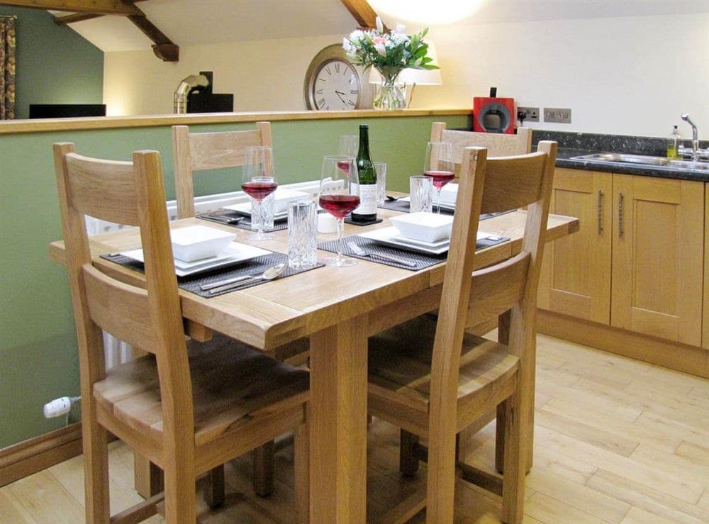 Stylish dining area at The Coach House in Brampton, Cumbria