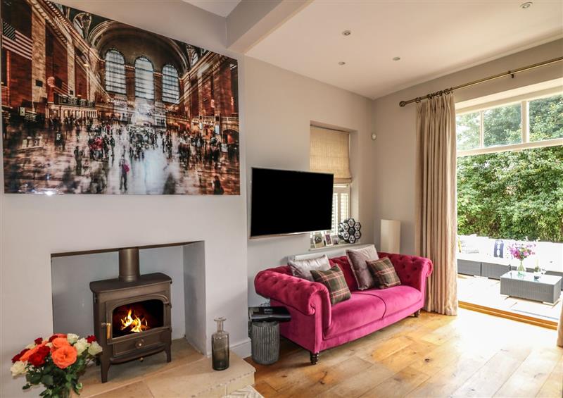 Relax in the living area at The Coach House, Burton Coggles