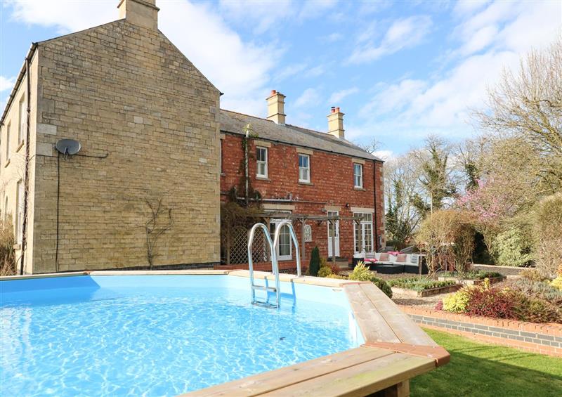 There is a swimming pool at The Coach House, Burton Coggles