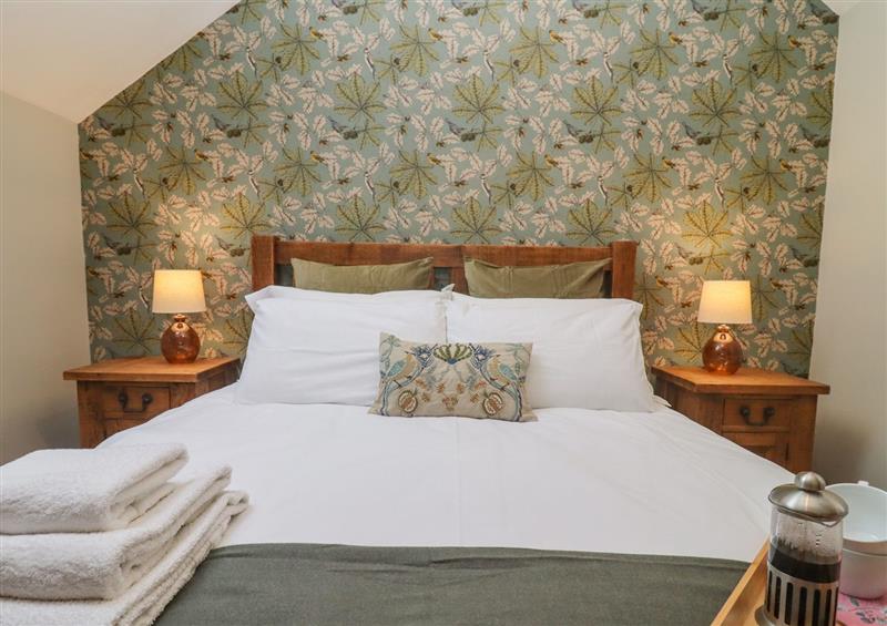 A bedroom in The Coach House at The Coach House, Cheltenham