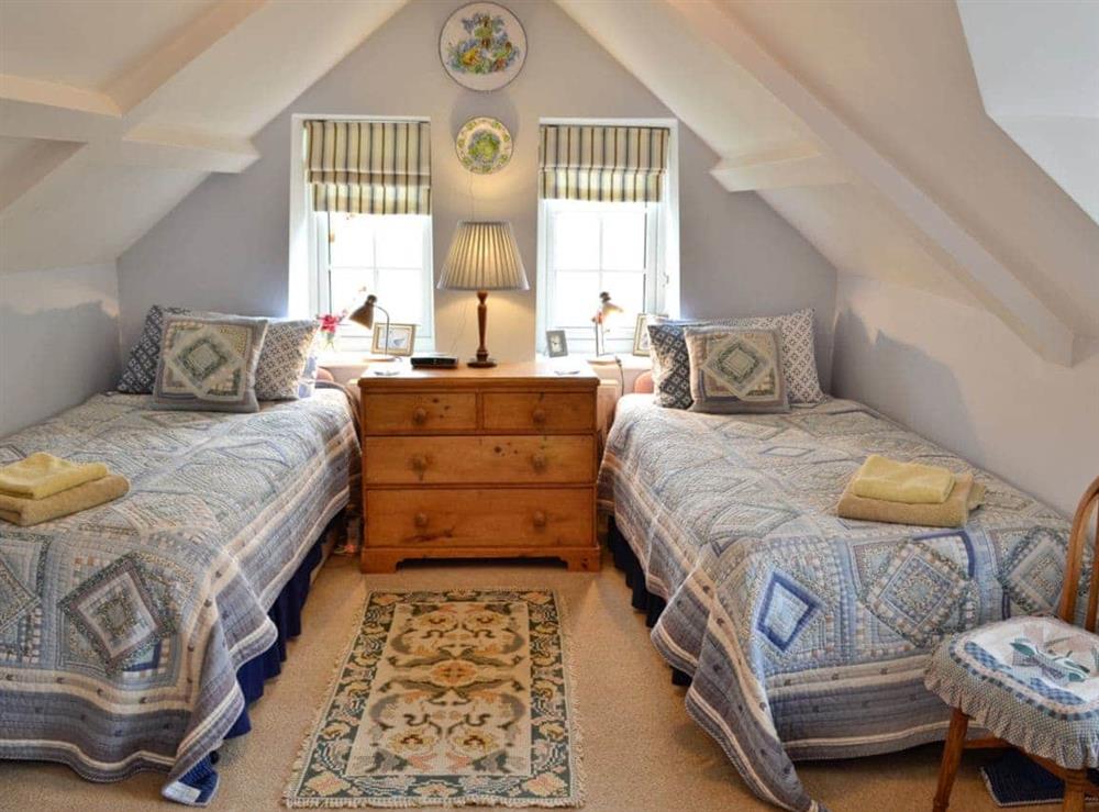 Twin bedroom at The Coach House in Chideock, Bridport, Dorset., Great Britain