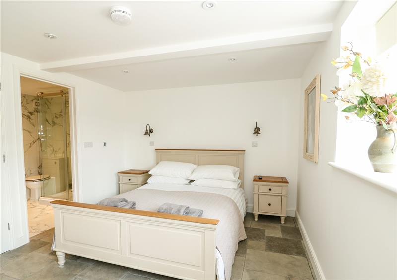 A bedroom in The Coach House at The Coach House, Cranwell Village near Leasingham