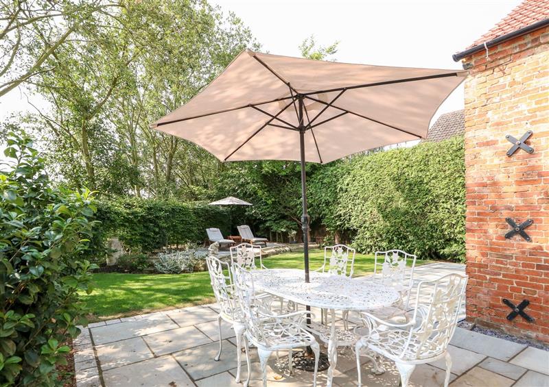 Enjoy a cup of tea on the patio at The Coach House, Cranwell Village near Leasingham