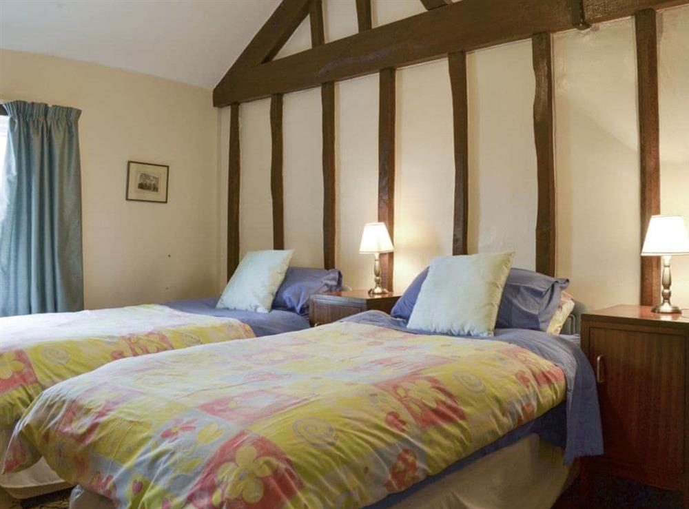 Characterful twin bedroom at The Coach House in Craven Arms, Shropshire