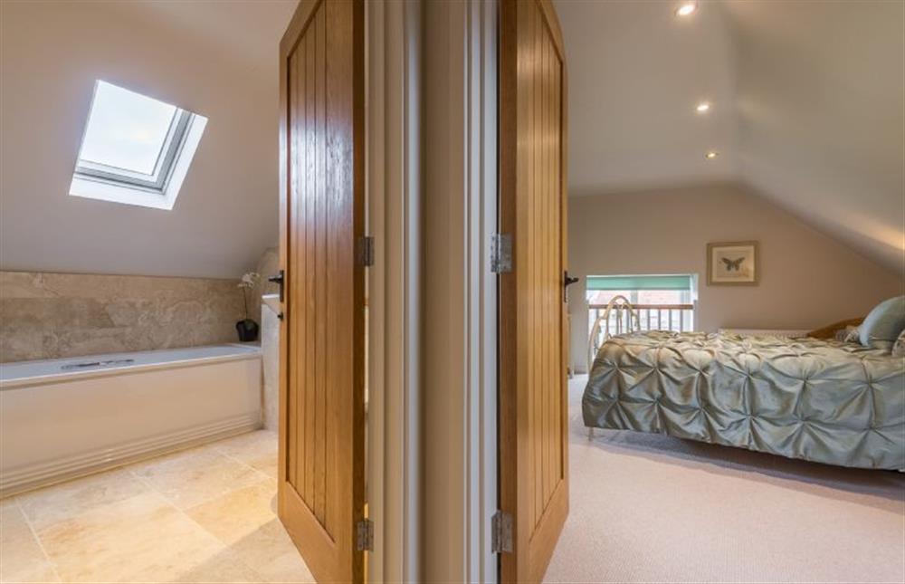 First floor: Bedroom two and family Bathroom at The Coach House, Docking near Kings Lynn