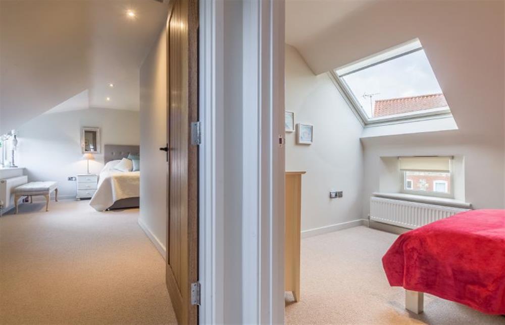 First floor: Master bedroom and Bedroom three at The Coach House, Docking near Kings Lynn