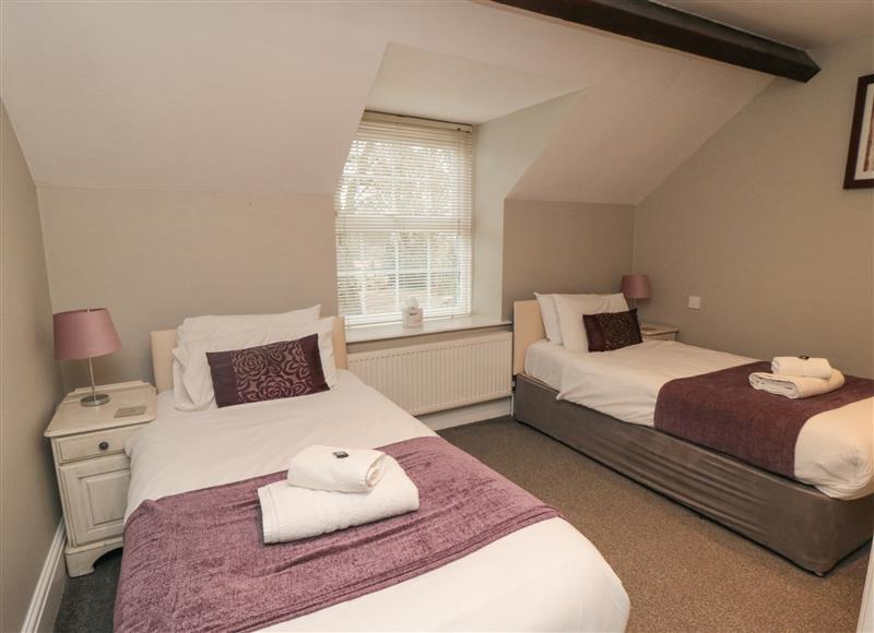 A bedroom in The Coach House at The Coach House, East Ayton