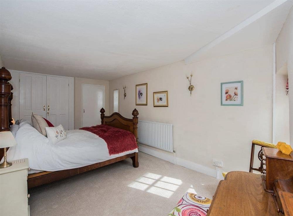 Large bedroom with fitted wardrobes at The Coach House in Fremington, near Richmond, North Yorkshire