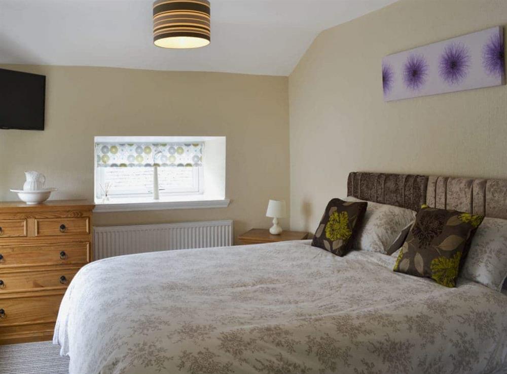 Kingsize bedroom at The Coach House in Greenodd, near Ulverston, Cumbria