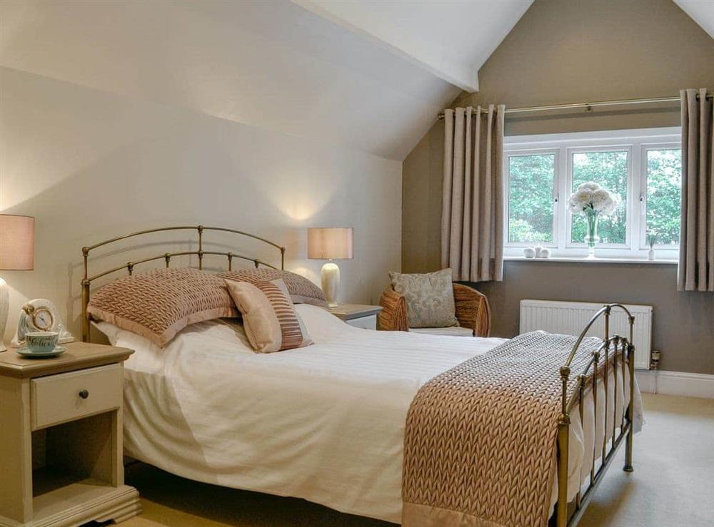 Spacious and comfortable double bedroom at The Coach House in Keswick, Cumbria