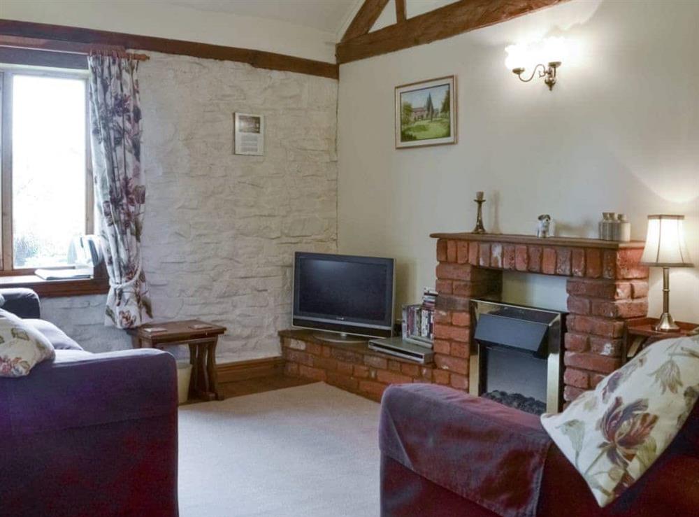 Welcoming living area at The Coach House in Kington, near Hereford, Herefordshire