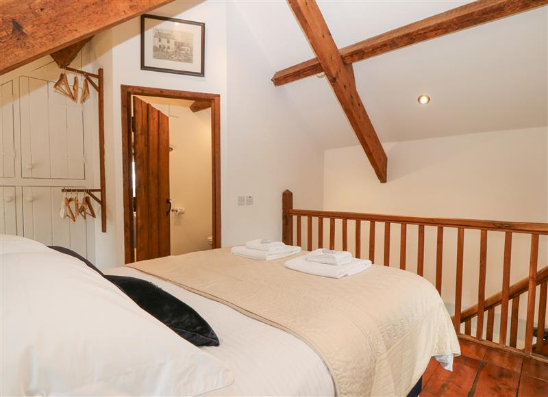 A bedroom in The Coach House (photo 2) at The Coach House, Llangybi near Criccieth
