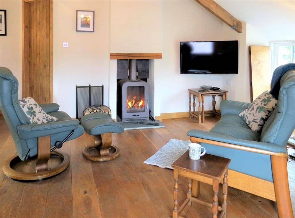 Living area at The Coach House Loft in Llangrannog, Dyfed