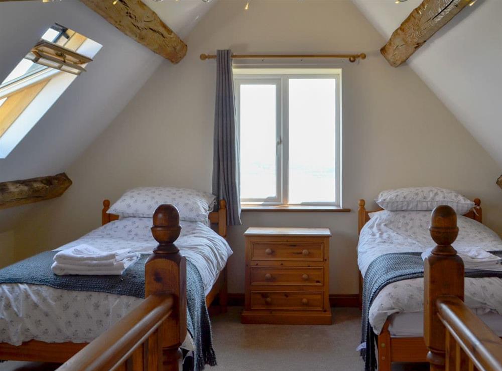 Twin bedroom at The Coach House in Lydney, Gloucestershire