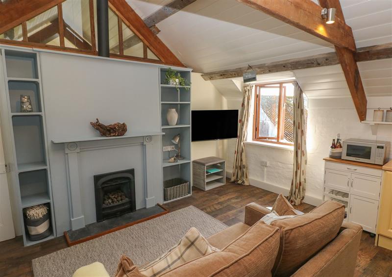 Enjoy the living room at The Coach House, Merrion near Pembroke