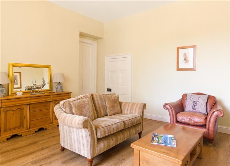 Enjoy the living room at The Coach House, Middleton Hall near Belford