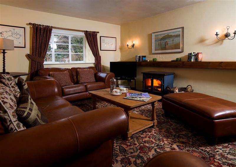 Relax in the living area at The Coach House, Pencaenewydd near Trefor