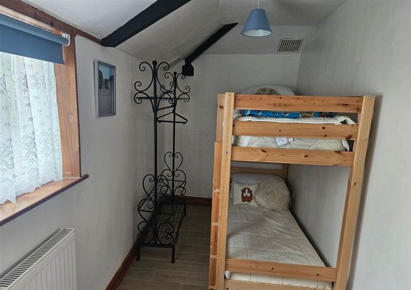A bedroom in The Coach House (photo 3) at The Coach House, Redruth