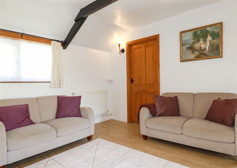 Relax in the living area at The Coach House, Redruth