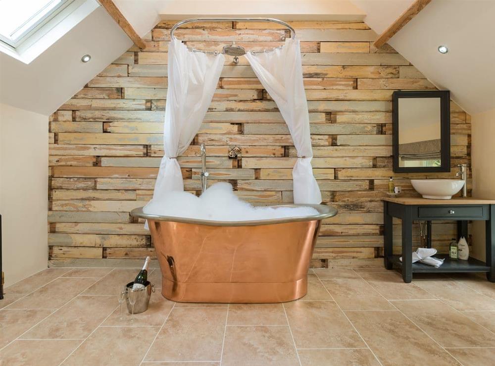 Open -en-suite with impressive copper bath at The Coach House in Riding Mill, near Corbridge, Northumberland