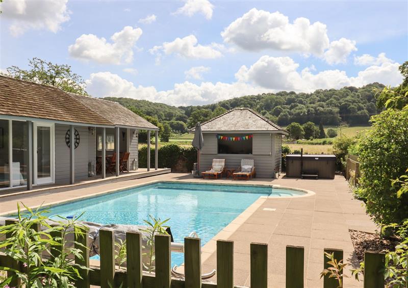 Enjoy the swimming pool at The Coach House, Ross-On-Wye