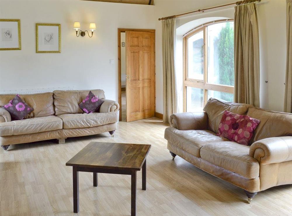 Light and airy lounge at The Coach House in Somersal Herbert, nr Ashbourne, Derbyshire