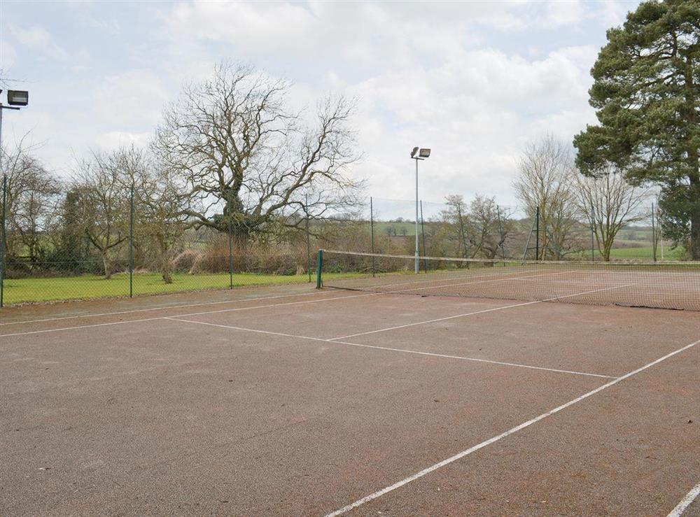 Shared tennis court at The Coach House in Somersal Herbert, nr Ashbourne, Derbyshire